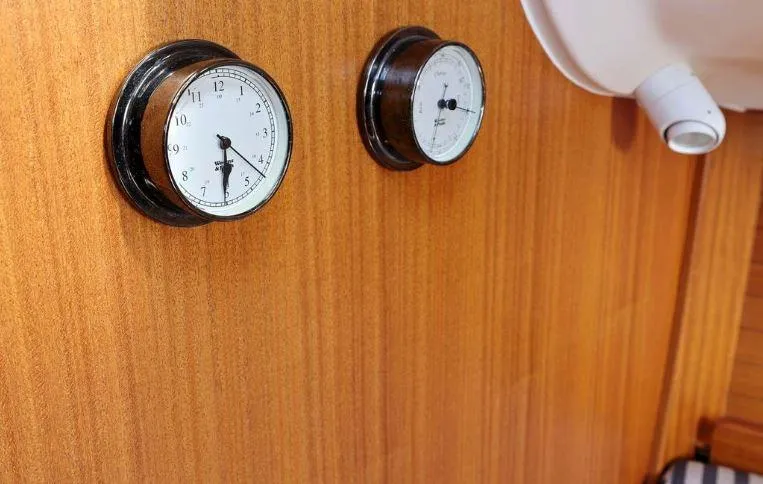 Slide: The Image of Wooden yacht interior with two nautical gauges, X-Yachts X-362 Sport, 2000 model. - 13