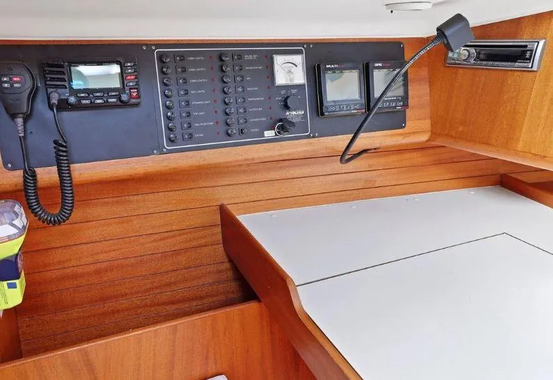 Slide: The Image of Navigation panel of 2000 X-Yachts X-362 Sport with communication equipment and controls. - 16
