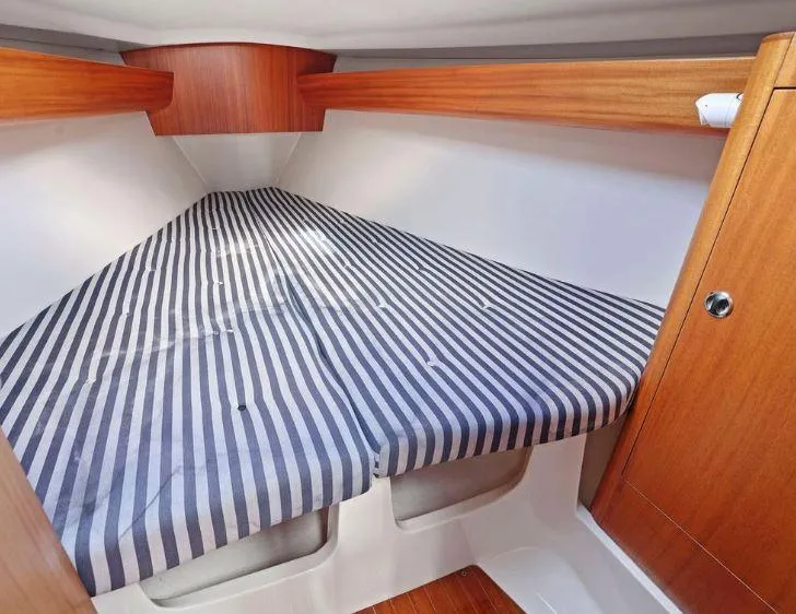 Slide: The Image of Cabin interior of 2000 X-Yachts X-362 Sport with striped bedding. - 22