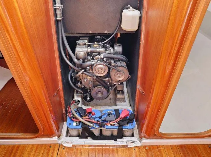 Slide: The Image of Engine compartment of a 2000 X-Yachts X-362 Sport sailboat, showcasing mechanical components. - 23