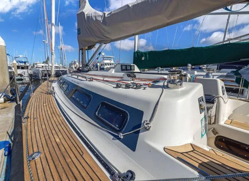 Slide: The Image of Sailboat X-Yachts X-362 Sport 2000 docked, showcasing sleek deck and rigging. - 5