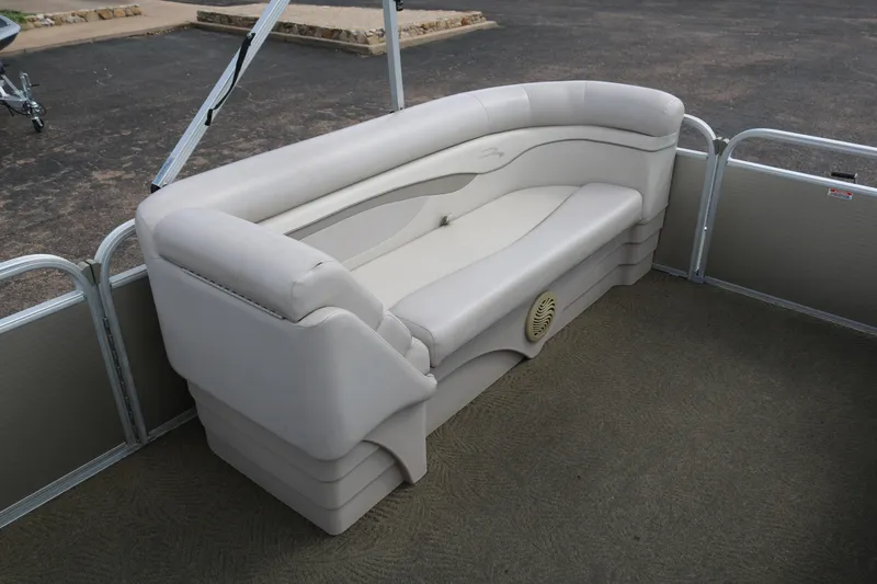 Slide: The Image of 2015 Bennington 24SSRX pontoon boat interior with cushioned seating. - 12