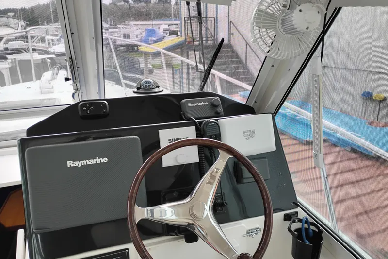 Slide: The Image of Helm of 2009 Albin 32 Tournament Express with Raymarine navigation equipment. - 18