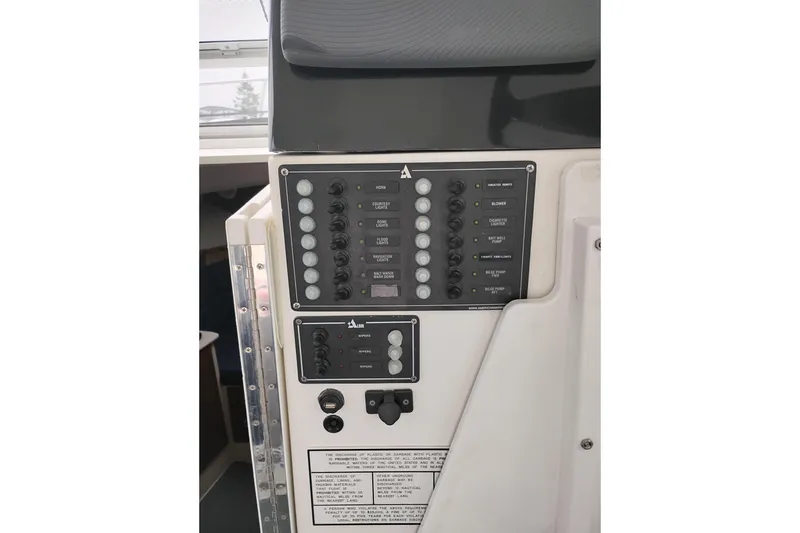 Slide: The Image of Control panel of a 2009 Albin 32 Tournament Express boat. - 22