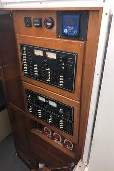 Slide: The Image of Control panel of 2009 Albin 32 TE boat with gauges and switches. - 33