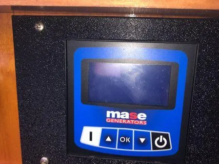 Slide: The Image of Control panel of Mase generator on 2009 Albin 32 TE boat. - 34