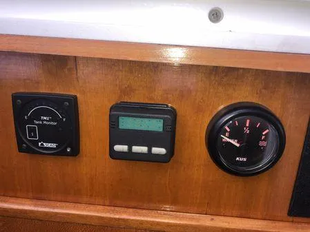 Slide: The Image of Control panel of a 2009 Albin 32 TE boat with gauges and monitor. - 35