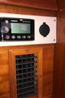 Slide: The Image of 2009 Albin 32 TE interior with Fusion MS-ABX300 stereo system and wooden vent. - 37