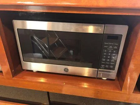 Slide: The Image of Built-in GE microwave in wooden cabinet on Albin 32 TE, 2009 model. - 44