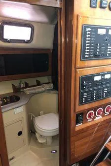 Slide: The Image of 2009 Albin 32 TE yacht interior with bathroom and control panel. - 49