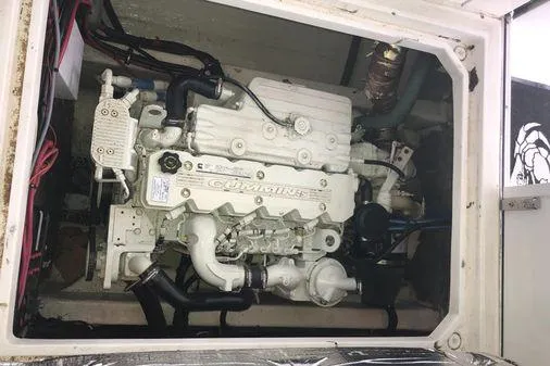 Slide: The Image of Engine compartment of a 2009 Albin 32 TE boat, featuring a Cummins engine. - 55