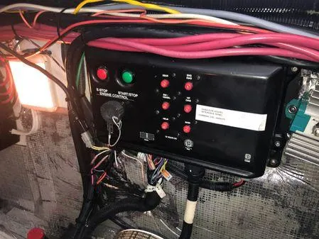 Slide: The Image of Control panel with wiring in a 2009 Albin 32 TE boat engine compartment. - 60