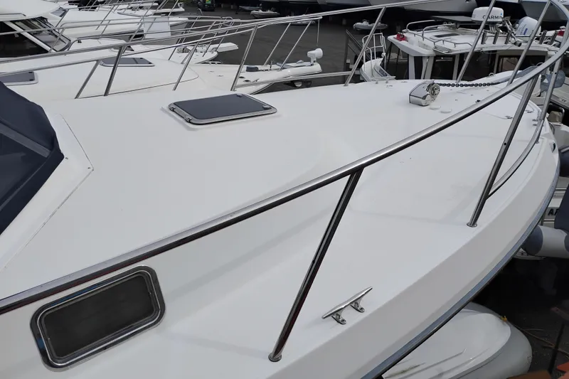 Slide: The Image of 2009 Albin 32 Tournament Express boat deck with railing and hatch. - 61