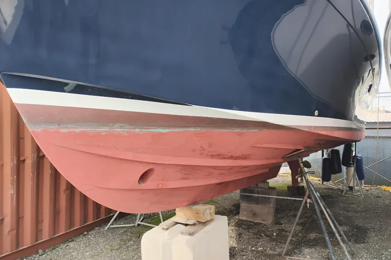 Slide: The Image of 2009 Albin 32 Tournament Express boat hull on dry dock for maintenance. - 65