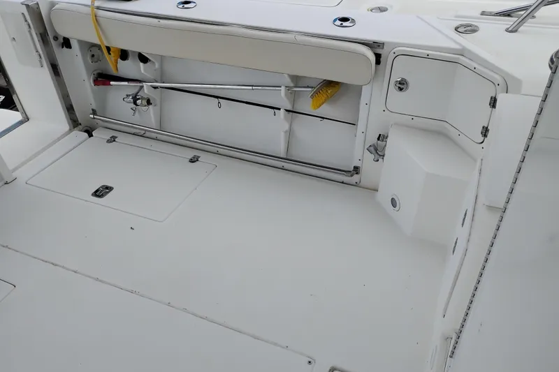 Slide: The Image of 2009 Albin 32 Tournament Express boat deck with storage compartments and equipment. - 7