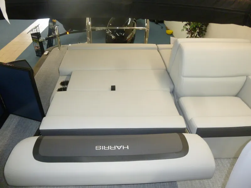 Slide: The Image of Luxurious seating on 2025 Harris CX 230 boat, featuring sleek design and comfortable upholstery. - 2