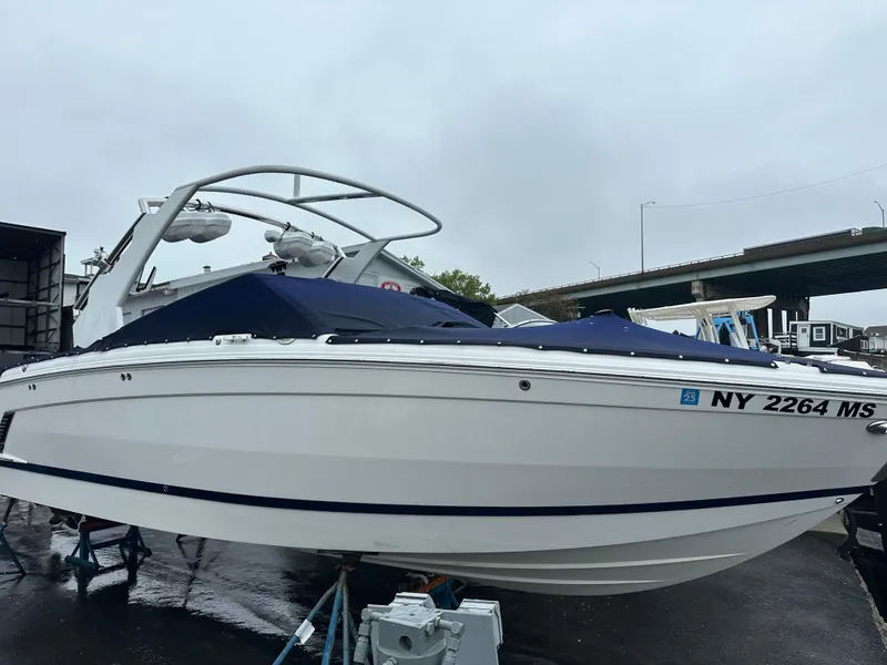 Slide: The Image of 2022 Cobalt R8 Surf boat on display, featuring sleek design and modern features. - 19