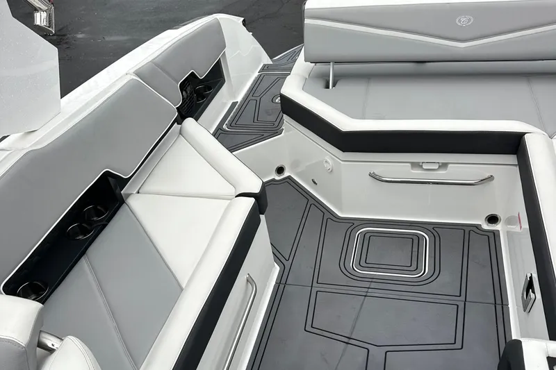 Slide: The Image of 2022 Cobalt R8 Surf boat interior with sleek seating and modern design. - 21