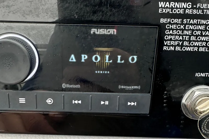 Slide: The Image of Fusion Apollo stereo system in a 2022 Cobalt R8 Surf boat dashboard. - 27