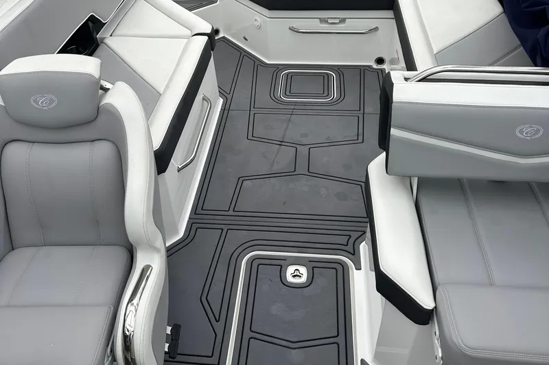 Slide: The Image of 2022 Cobalt R8 Surf boat interior with gray seating and sleek design. - 29