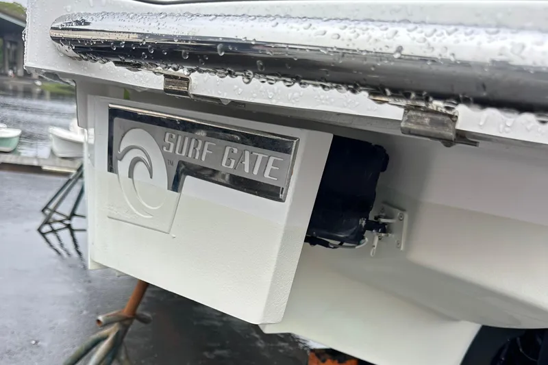 Slide: The Image of 2022 Cobalt R8 Surf boat with Surf Gate technology, enhancing wake surfing experience. - 32