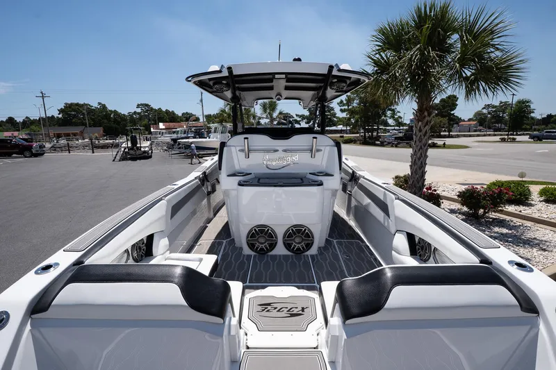 Slide: The Image of 2023 Sunsation 32 CCX boat interior with sleek seating and modern design. - 13