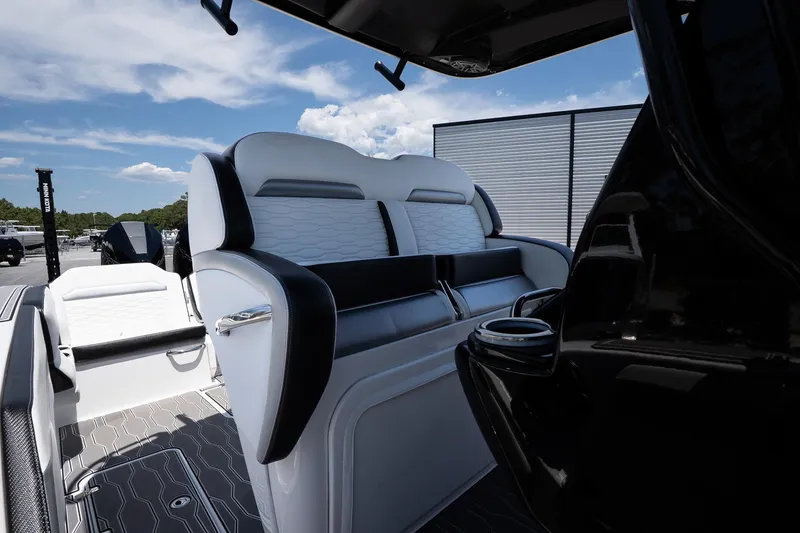 Slide: The Image of 2023 Sunsation 32 CCX boat interior with sleek seating and modern design. - 17