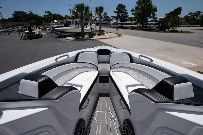 Slide: The Image of 2023 Sunsation 32 CCX boat interior with sleek seating and modern design. - 22