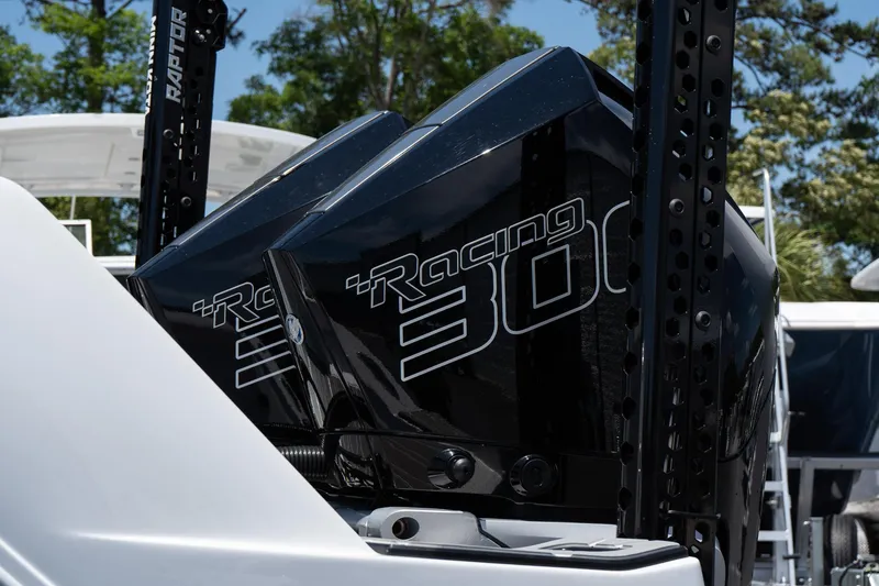 Slide: The Image of 2023 Sunsation 32 CCX boat with dual Racing 300 engines, showcasing sleek design and power. - 6