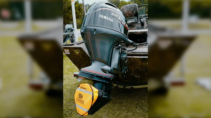 Slide: The Image of 2025 G3 18CC boat with Yamaha outboard motor and propeller safety cover. - 19