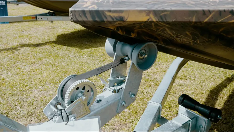 Slide: The Image of Trailer winch system for 2025 G3 18CC boat on grass. - 3