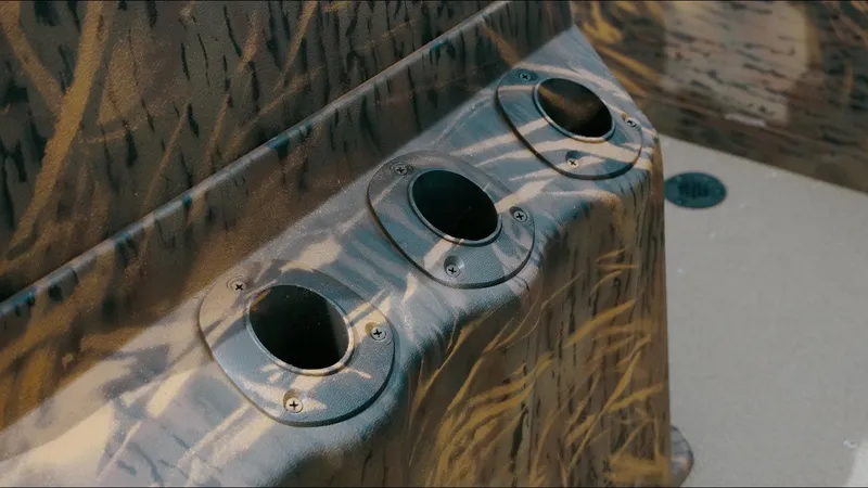 Slide: The Image of Camouflage boat rod holders on 2025 G3 18CC model. - 5