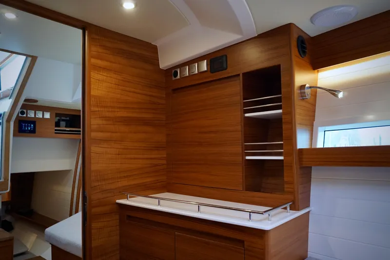 Slide: The Image of Luxurious interior of 2023 Delta Powerboats 33 Coupe with elegant wood finish and modern design. - 25