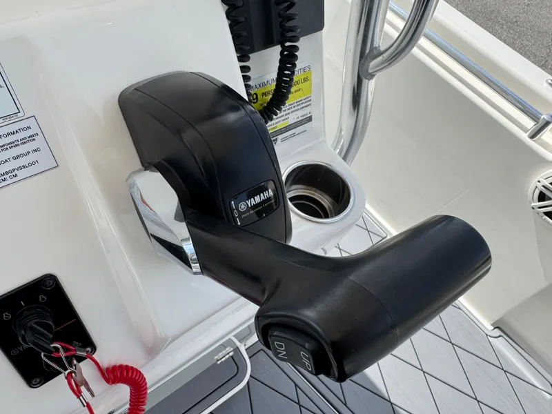 Slide: The Image of Throttle control of 2020 Cobia 220 Center Console boat with Yamaha branding. - 19