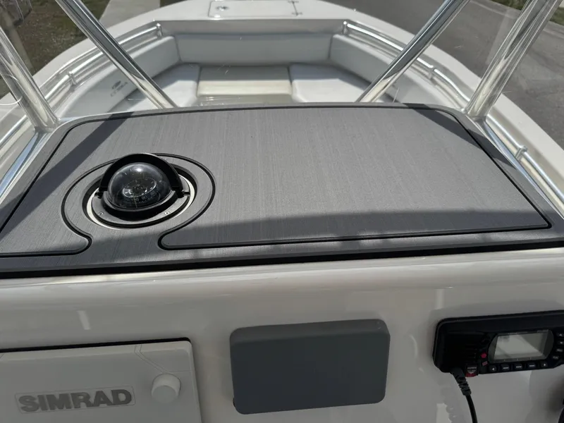 Slide: The Image of 2020 Cobia 220 Center Console boat dashboard with navigation equipment. - 23