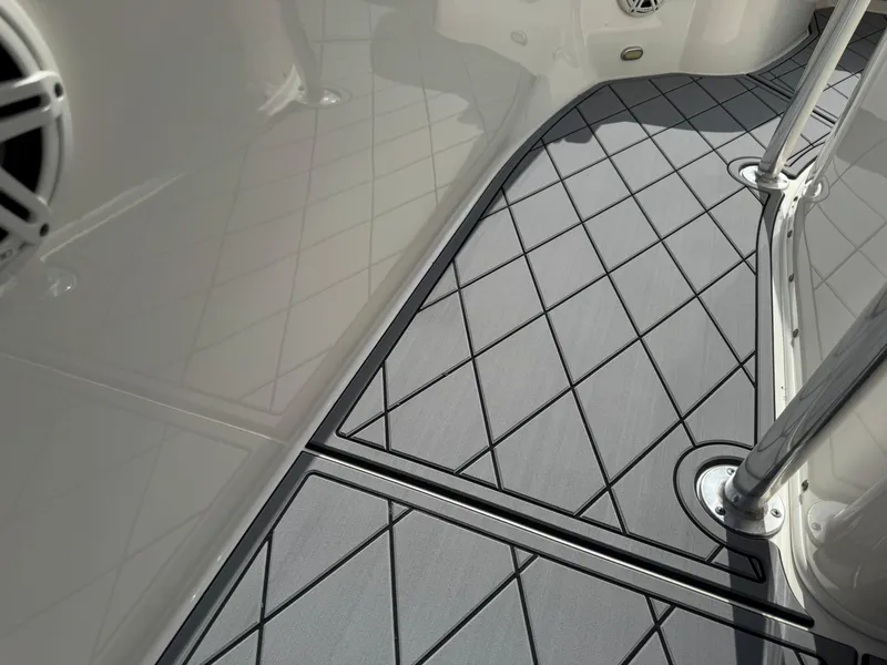 Slide: The Image of Interior view of 2020 Cobia 220 Center Console boat with diamond-patterned flooring. - 41