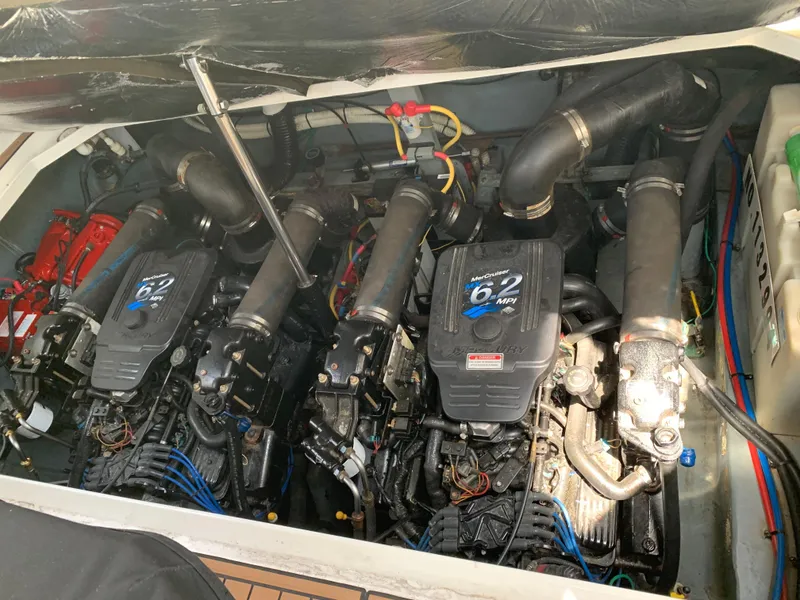 Slide: The Image of Engine compartment of a 2002 Sea Ray 340 Sundancer with twin MerCruiser 6.2 MPI engines. - 10