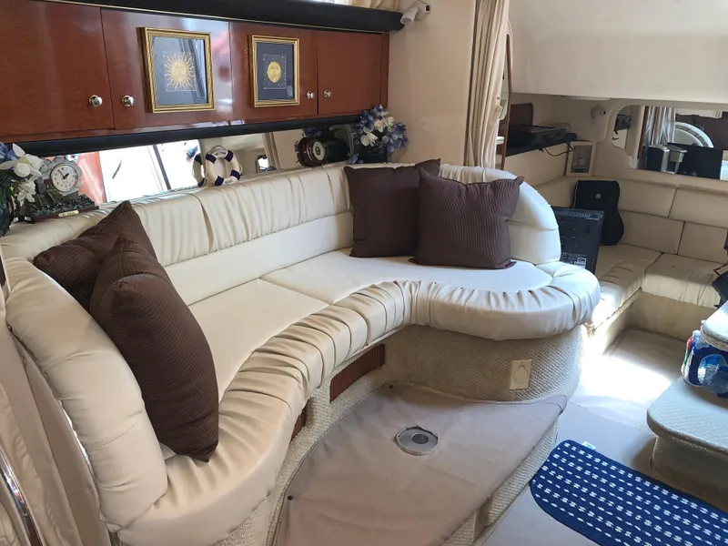 Slide: The Image of Luxurious interior of 2002 Sea Ray 340 Sundancer with plush seating and elegant decor. - 5