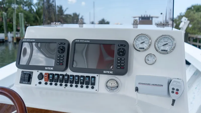 Slide: The Image of Control panel of 2021 C-Hawk 29CC boat with navigation and communication equipment. - 10