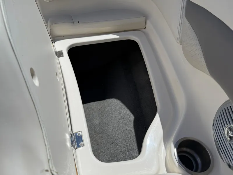 Slide: The Image of Storage compartment in 2006 Chaparral 220 SSi boat interior. - 28