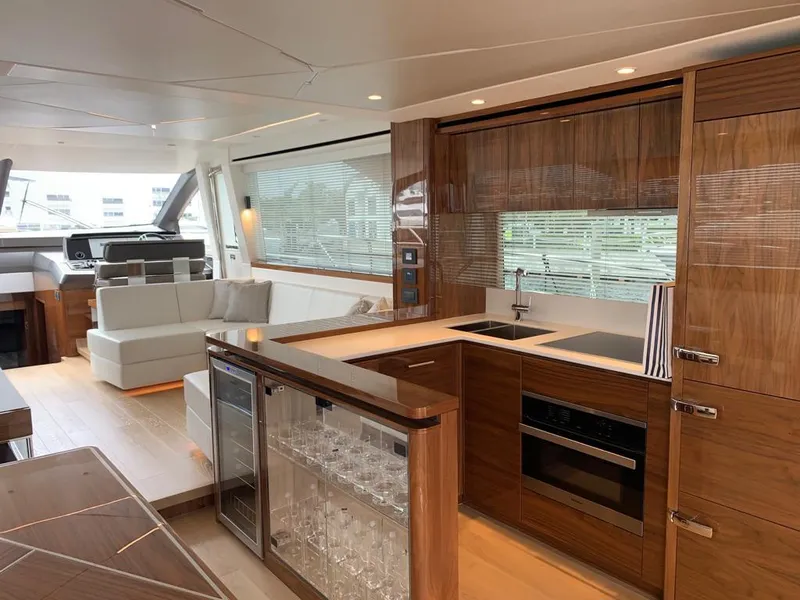 Slide: The Image of Luxurious interior of 2020 Sunseeker Manhattan 68 yacht with modern kitchen and seating area. - 10