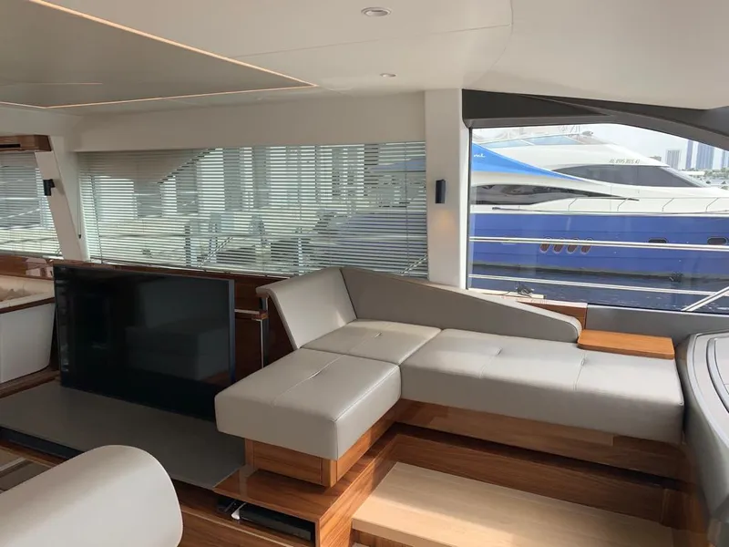 Slide: The Image of Luxurious interior of 2020 Sunseeker Manhattan 68 yacht with modern seating and large windows. - 12