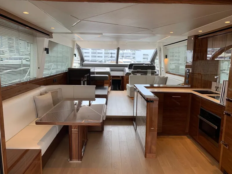 Slide: The Image of Luxurious interior of 2020 Sunseeker Manhattan 68 yacht with modern kitchen and dining area. - 13