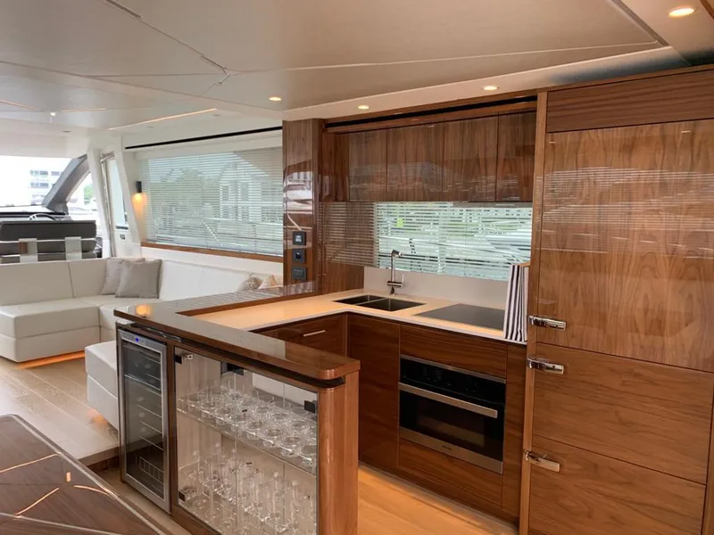 Slide: The Image of Luxurious interior of 2020 Sunseeker Manhattan 68 yacht with modern kitchen and seating area. - 15