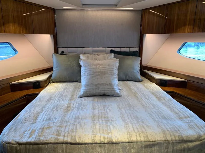 Slide: The Image of Luxurious bedroom interior of 2020 Sunseeker Manhattan 68 yacht with elegant bedding. - 22