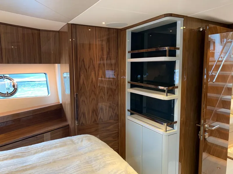 Slide: The Image of Luxurious interior of 2020 Sunseeker Manhattan 68 yacht with wood finishes and ocean view. - 24