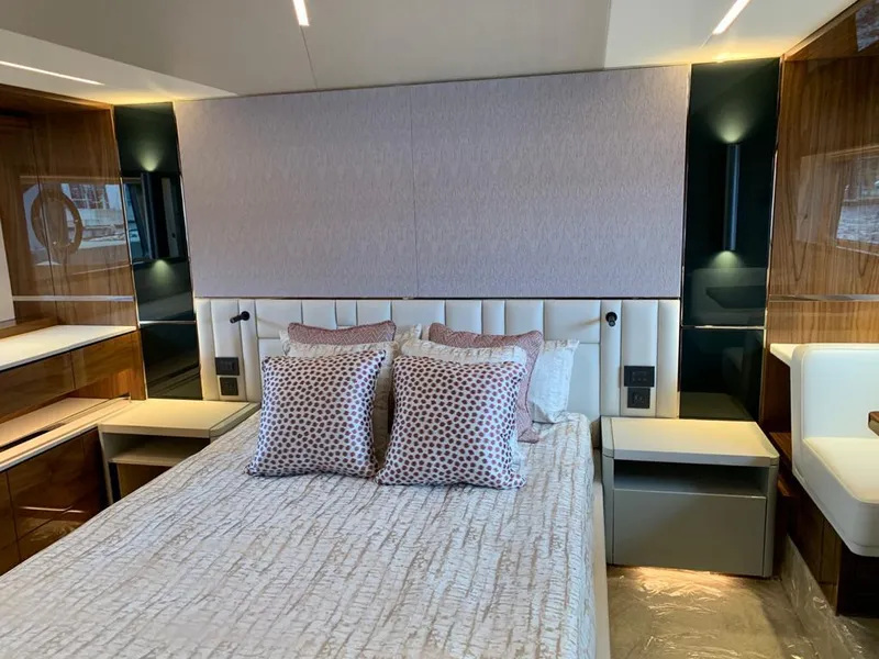 Slide: The Image of Luxurious bedroom interior of 2020 Sunseeker Manhattan 68 yacht with elegant bedding and modern design. - 26