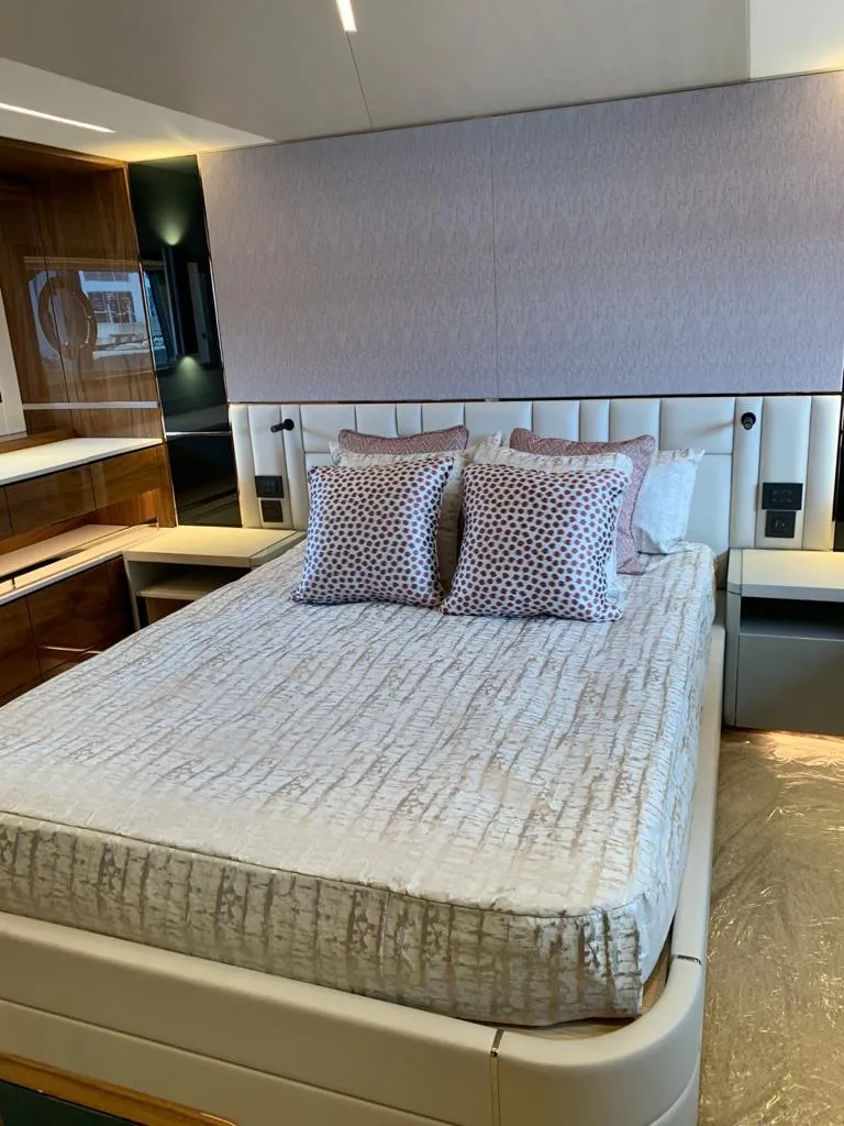 Slide: The Image of Luxurious bedroom interior of 2020 Sunseeker Manhattan 68 yacht with elegant bedding. - 27