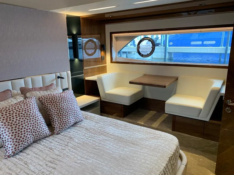Slide: The Image of Luxurious interior of 2020 Sunseeker Manhattan 68 yacht with elegant seating and bedding. - 29