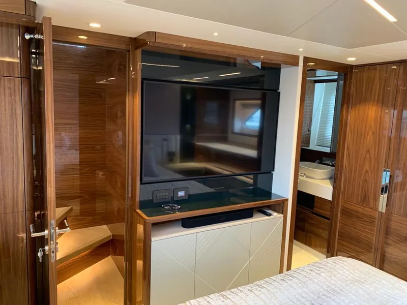 Slide: The Image of Luxurious interior of 2020 Sunseeker Manhattan 68 yacht with wood paneling and modern amenities. - 31